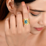 AGNIA Contemporary Ring with an encrusted Natural Blue Topaz and an Intricate Design in Brass with Gold Plating